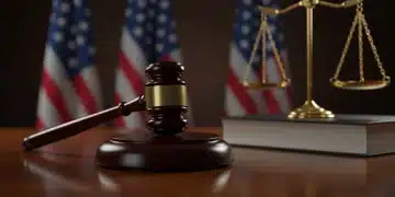 Gavel and law books on a desk, representing the US legal system and justice.