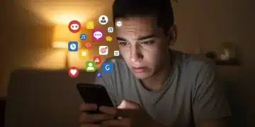 Distressed person looking at phone, surrounded by social media icons, illustrating phone's mood impact.